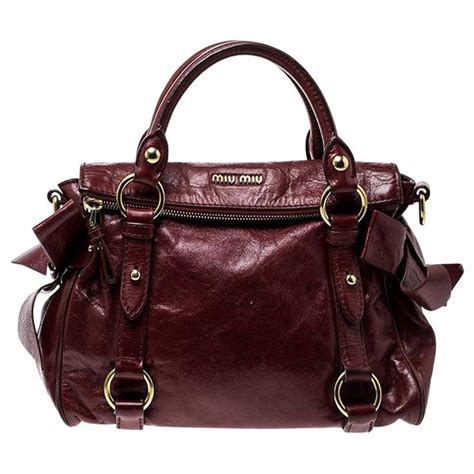 MIU MIU Red Vitello Lux Leather Bow Top Handle Bag.